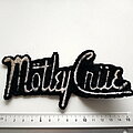 Mötley Crüe - Patch - Mötley Crüe  old shaped logo patch 850 used  size 7 x 15.5 cm