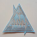 Def Leppard - Patch - Def Leppard very nice shaped light blue triangle patch d58  size 11.5x11cm/...