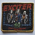 Exciter - Patch - Exciter 40 Years Of Heavy Metal Maniac Patch Gold Glitter Border
