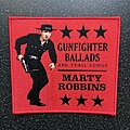 Marty Robbins - Patch - Marty Robbins - Gunfighter Ballads and Trail Songs woven patch (Red border)
