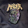 Molder - Pin / Badge - Molder Engrossed in Decay enamel pin