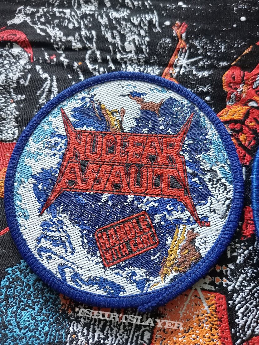 Nuclear Assault - Handle With Care woven patch comparision