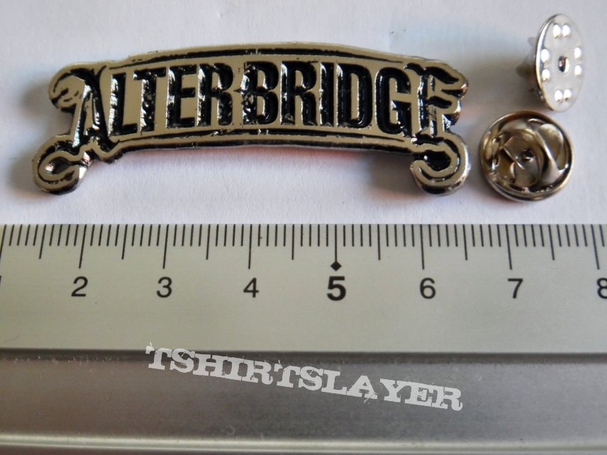 alter bridge shaped pin badge