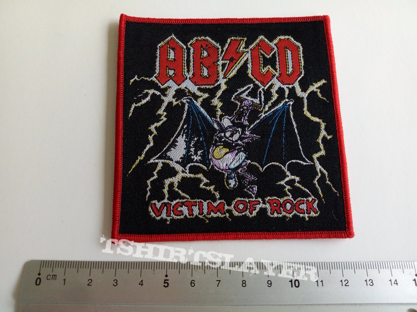 AB/CD victim of rock patch a296  red border