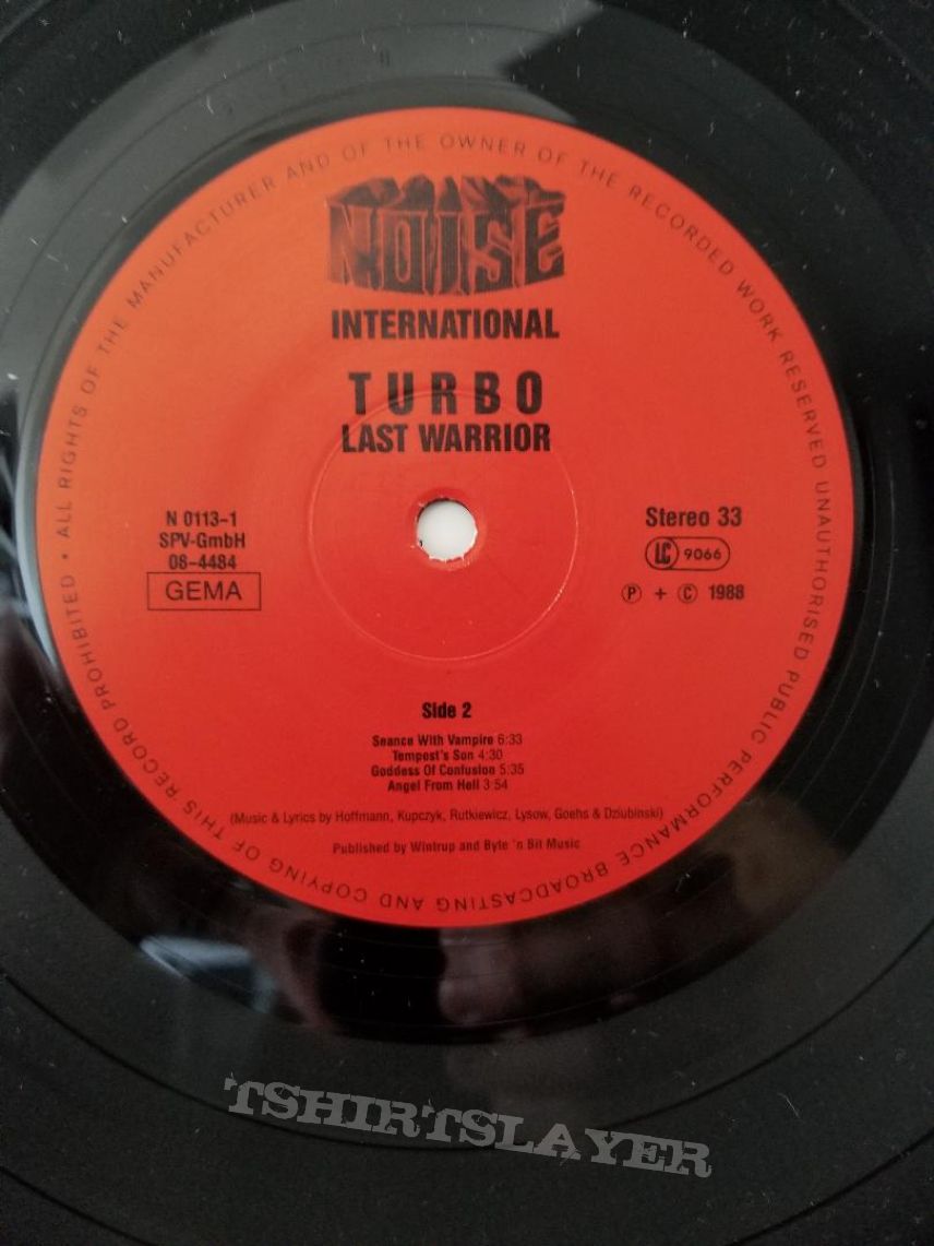 Turbo ' The Last Warrior ' Original Vinyl LP + Promotional Ad Turbo ' The Last Warrior ' Original Vinyl LP + Promotional Ad