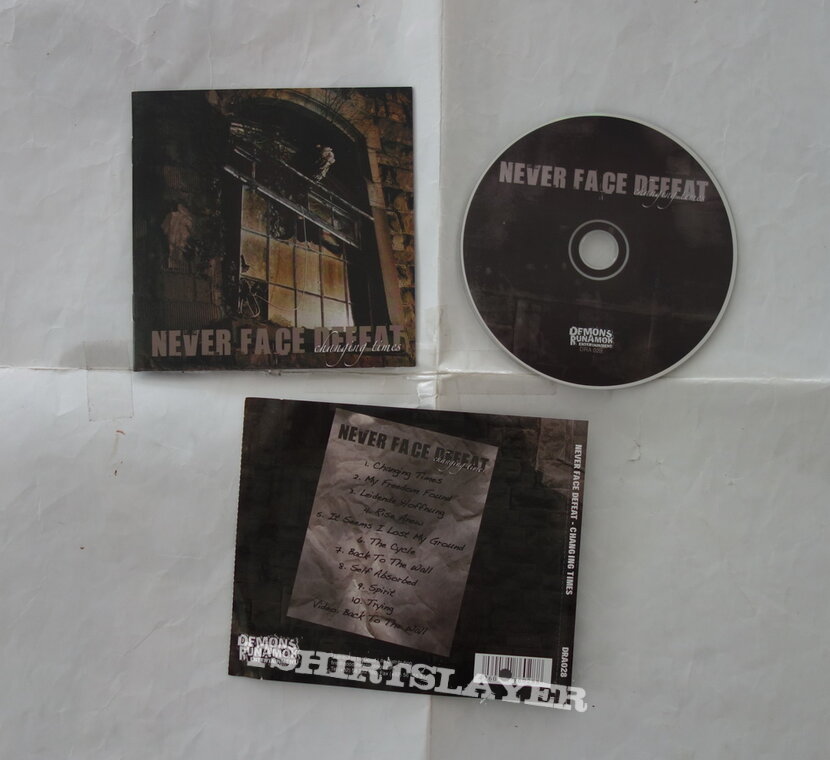 Never Face Defeat – Changing Times - Promo CD