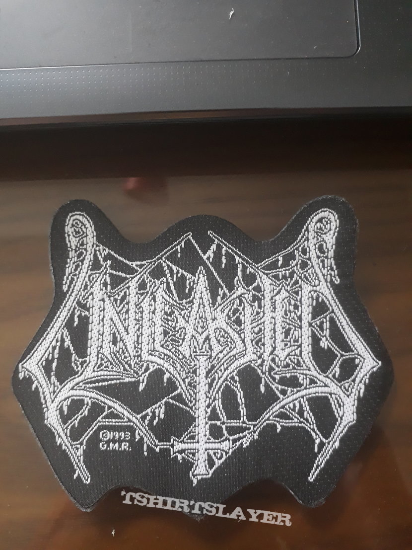 Official shaped Unleashed woven patch