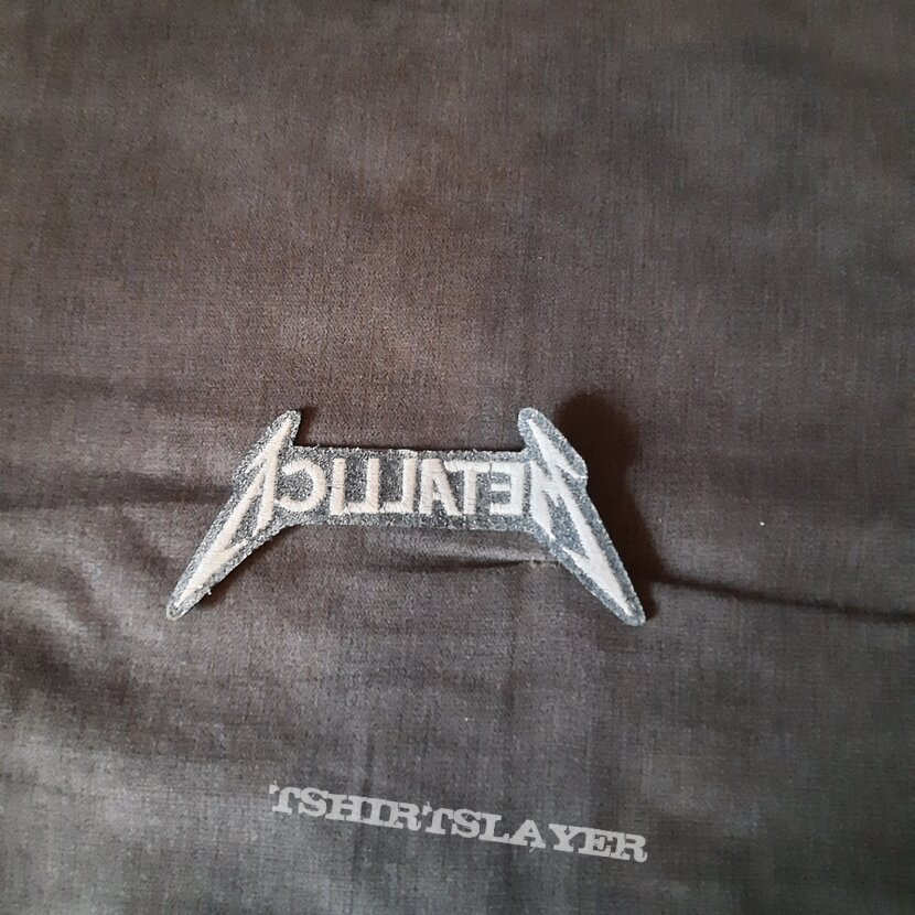 Metallica shaped woven patch