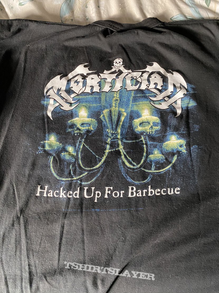 Mortician Hacked up for barbecue 98