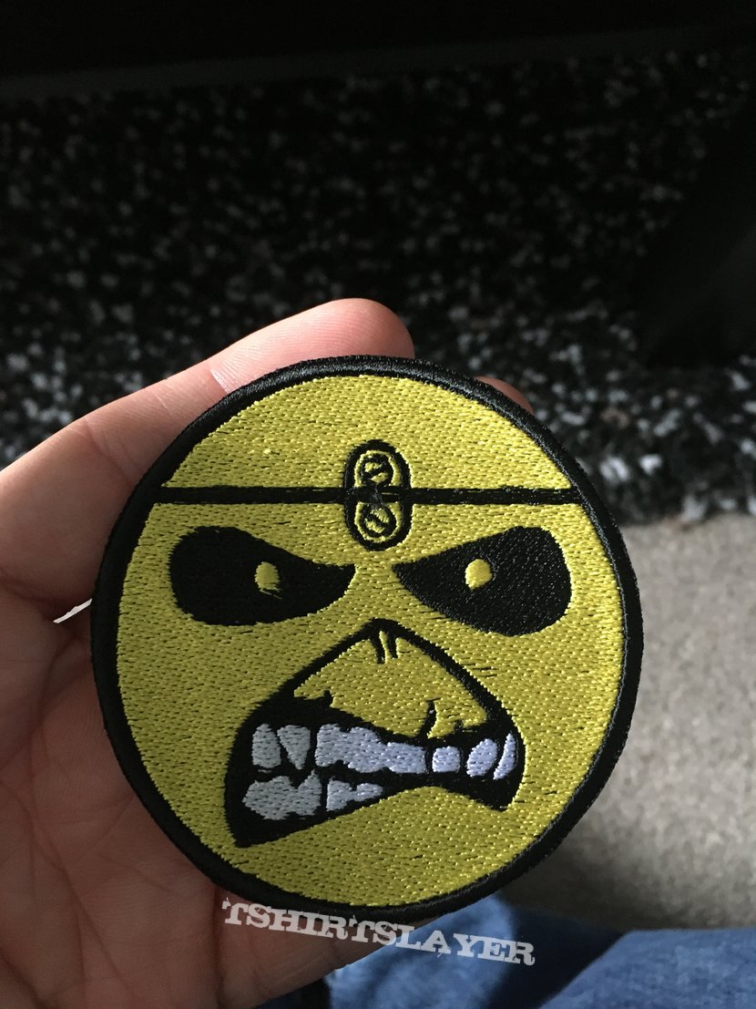 Iron maiden yellow Eddie face. TShirtSlayer TShirt and BattleJacket
