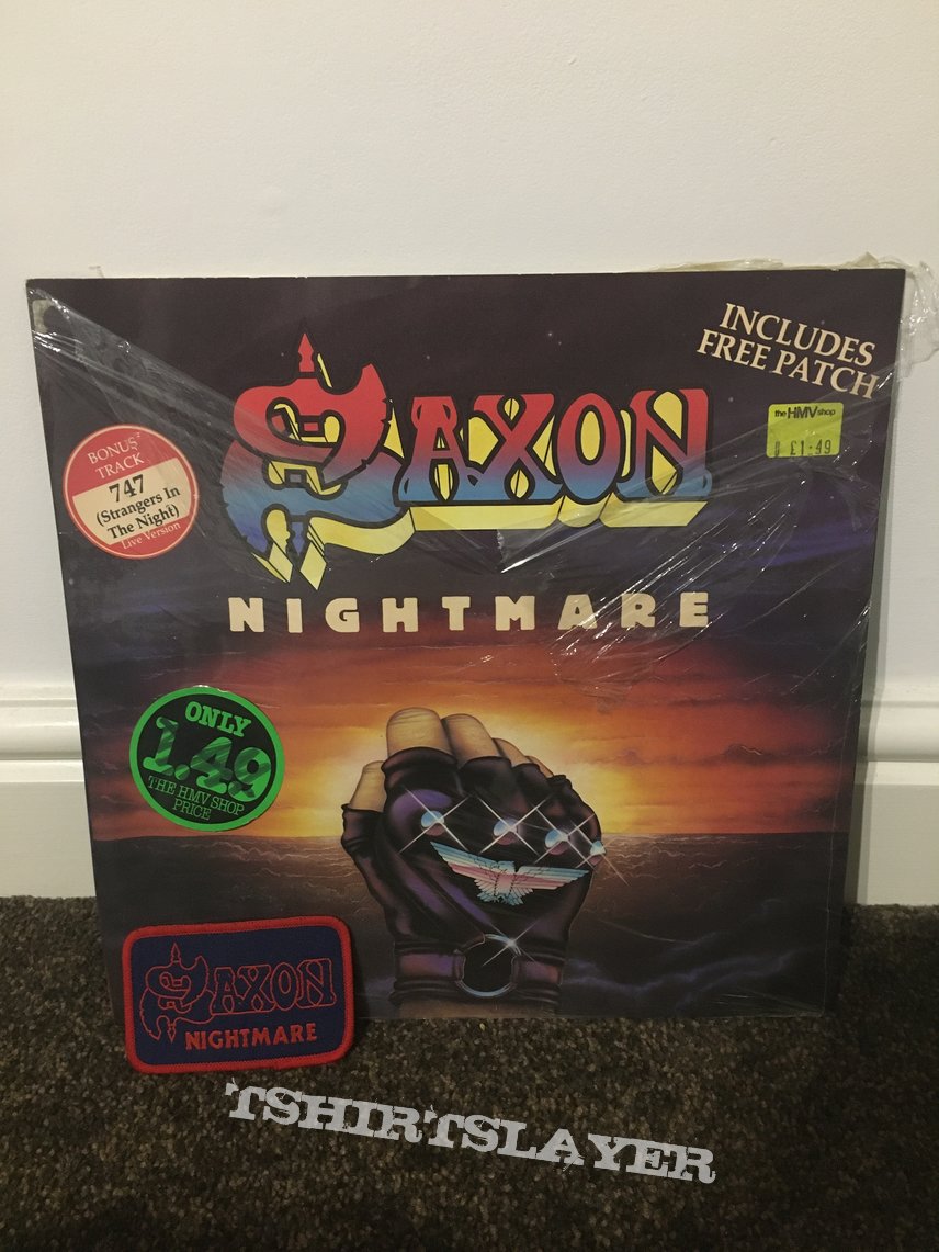 Saxon nightmare 12” single. Original- in wrapper condition with patch.