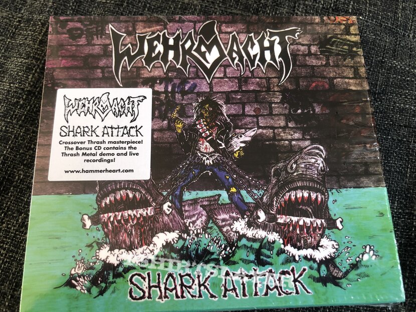 Various versions of Wehrmacht’s Shark Attack album