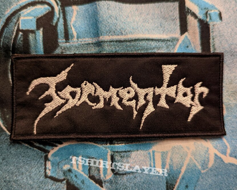Tormentor embroidered logo patch