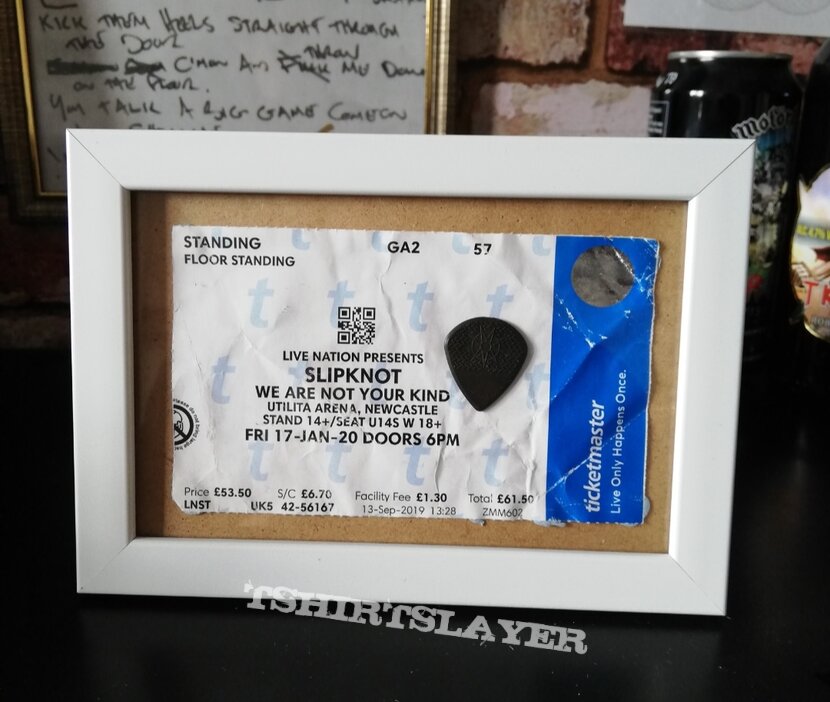 Various Framed guitar picks &amp; ticket stubs