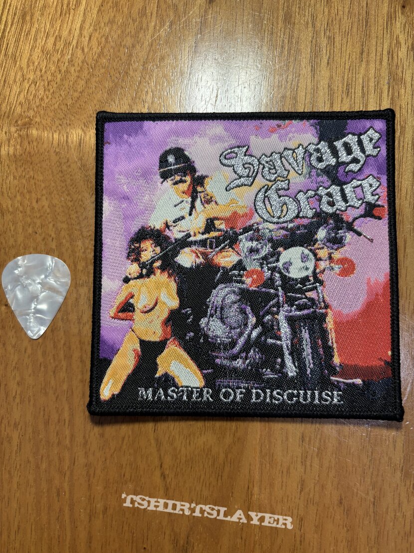 Savage Grace - Master of Disguise - Black Border (A745)